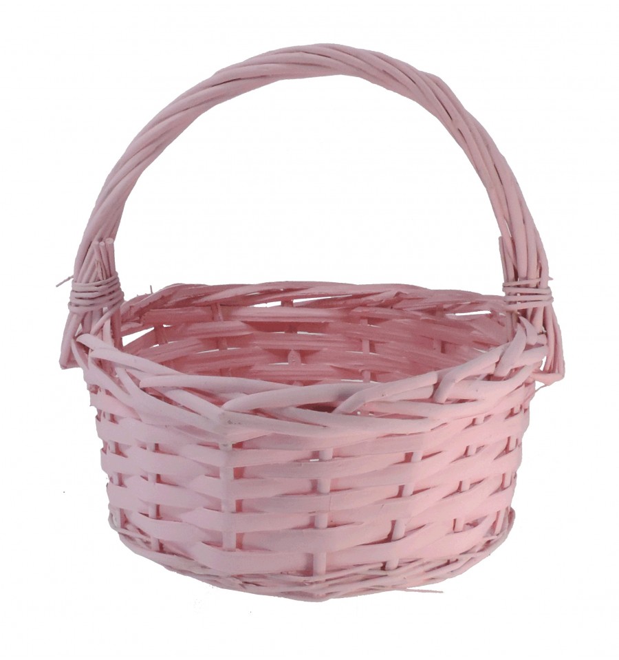 Dos cestas de mimbre decorativas en un bonito estilo rosa claro